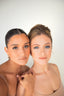 Two women pose for a photo. The essence of skin rejuvenation. They are posing for The Aesthetic Code, a medical spa in Prosper TX that offers anti-aging and skin rejuvenation aesthetic treatments.